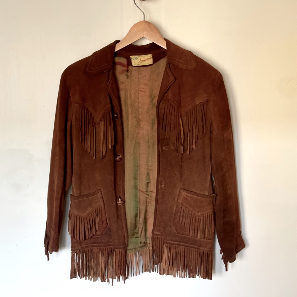 Vintage brown soft leather fringe jacket.